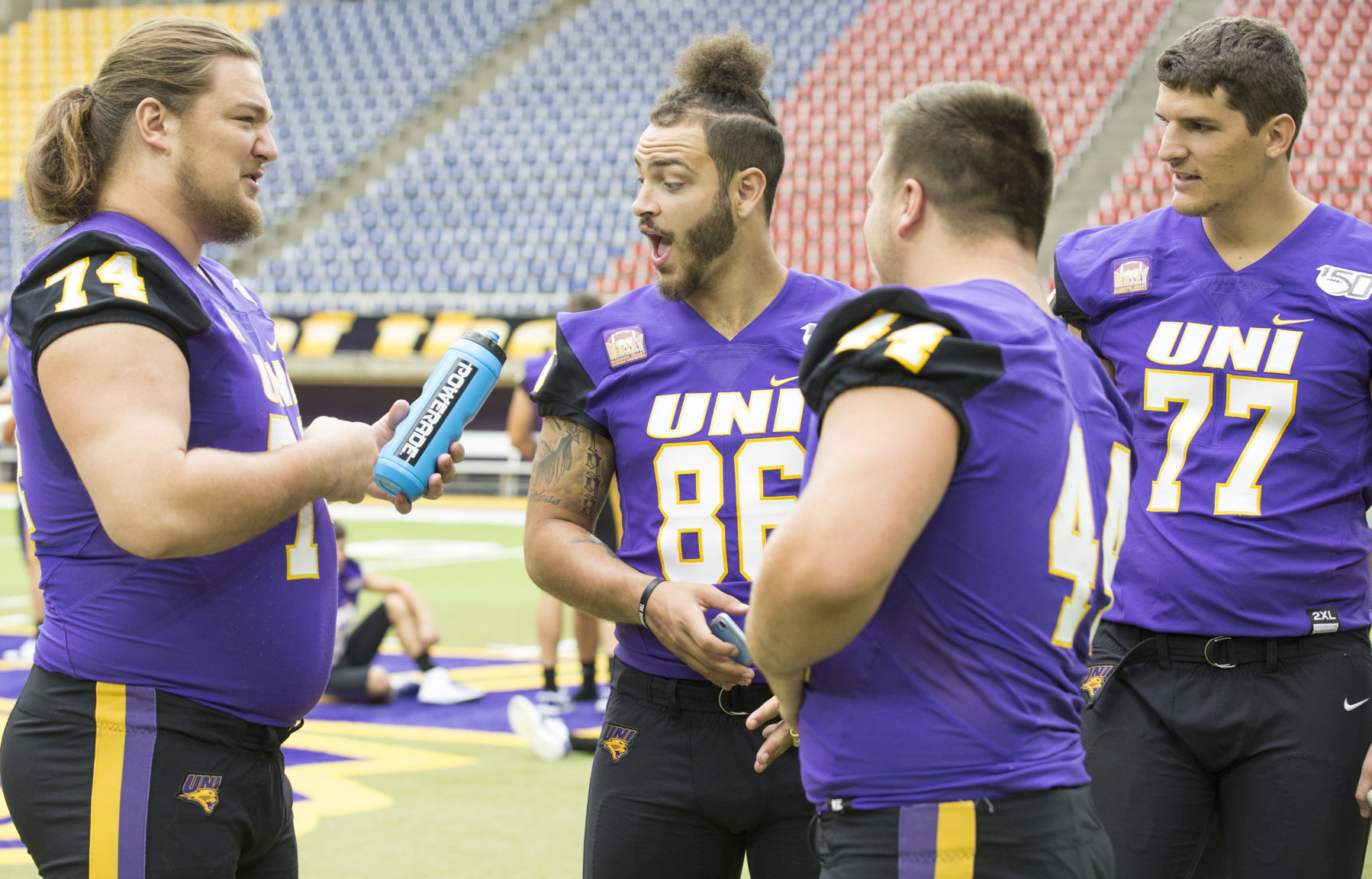 080719kw-uni-football-media-day-04